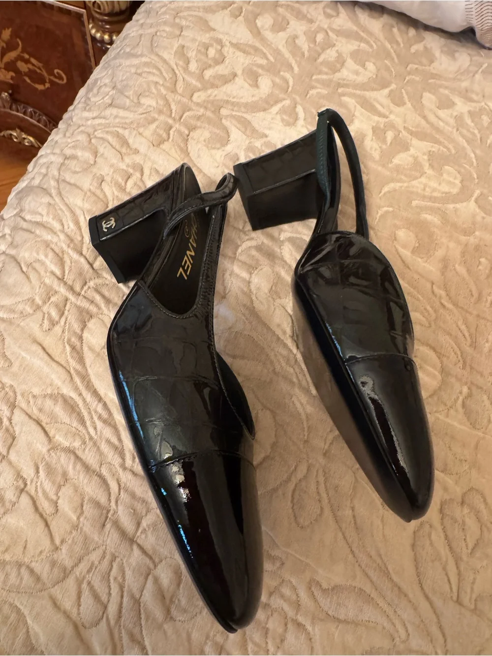 CHANEL Black Patent Leather Slingback Pumps with Cap Toe